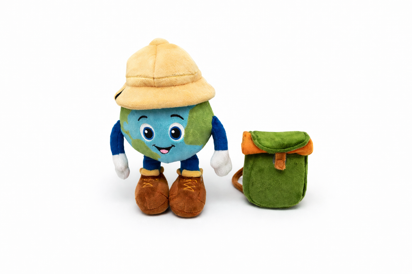 Plush toy resembling a planet with a yellow hat and green backpack on a white background